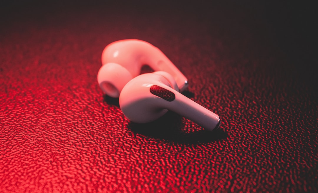 red-plastic-toy-on-red-textile-smbz6gqt-ci